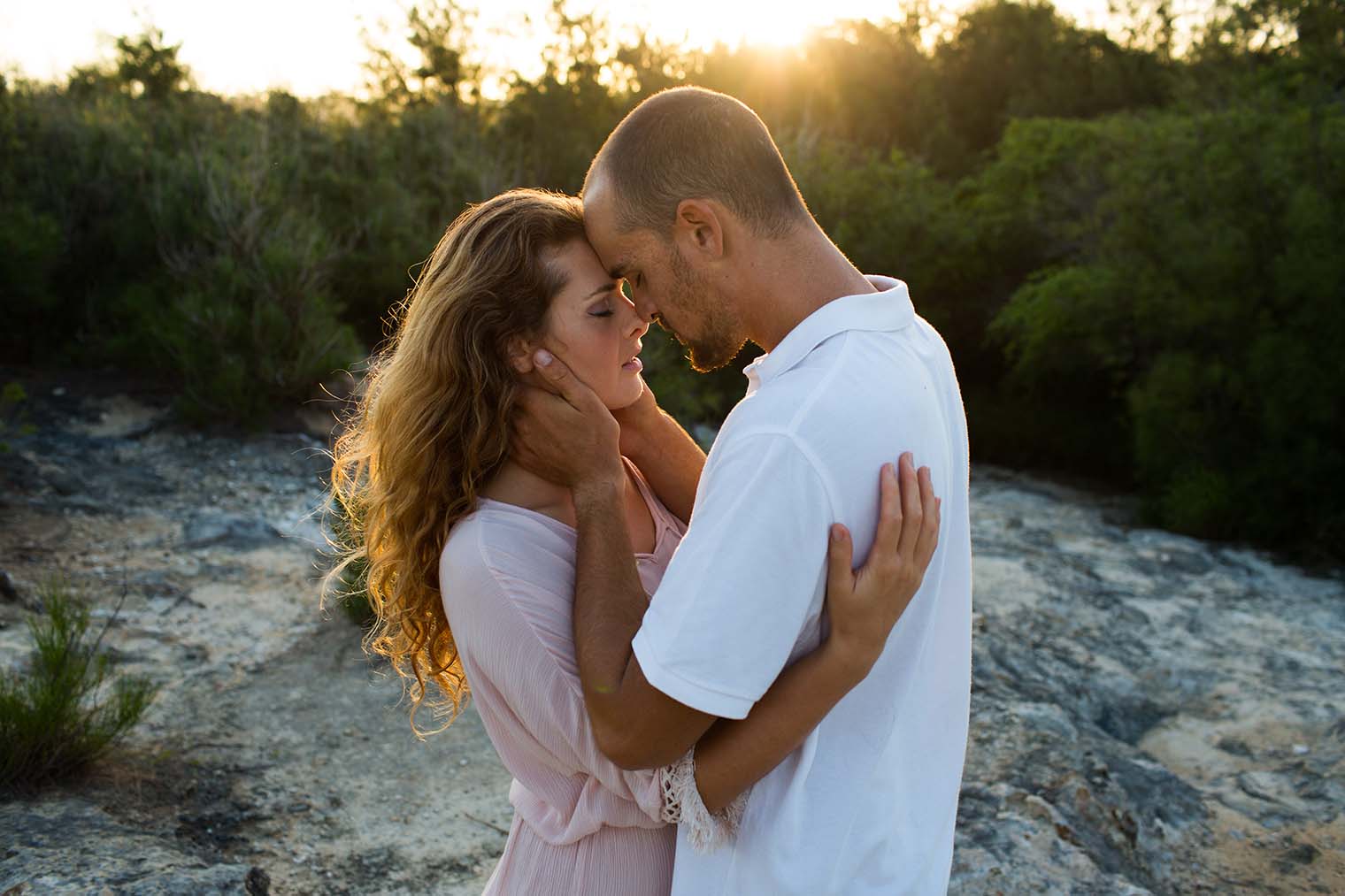 Sunset engagement photos at Maha'ulepu Trailhead