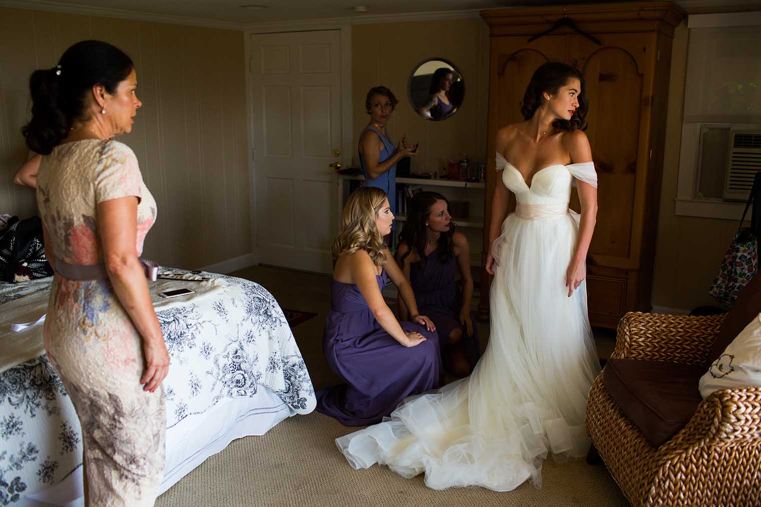 Bride doing final getting ready touches